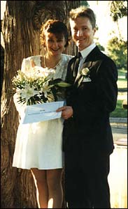 The newlyweds under a tree